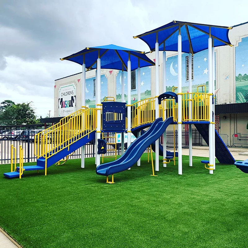 childrens play area with artificial turf