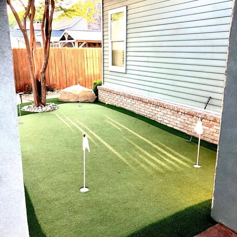 A small golf play area in backyard