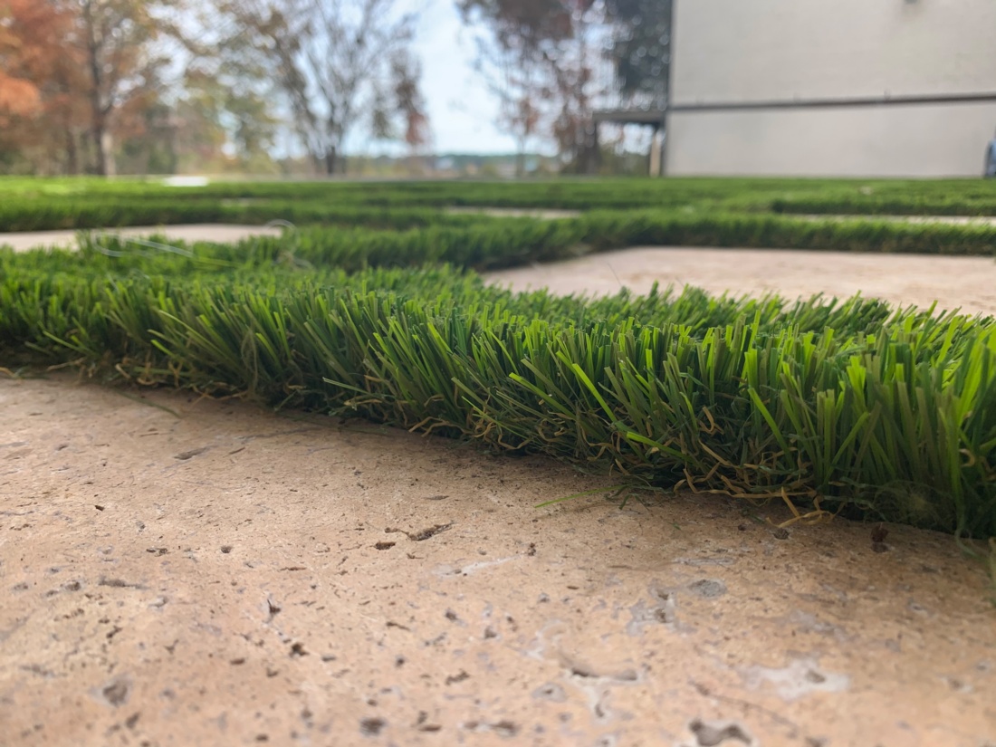 Yard with a perfect artificial lawn
