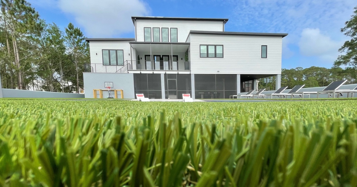 Modern house with green lawn